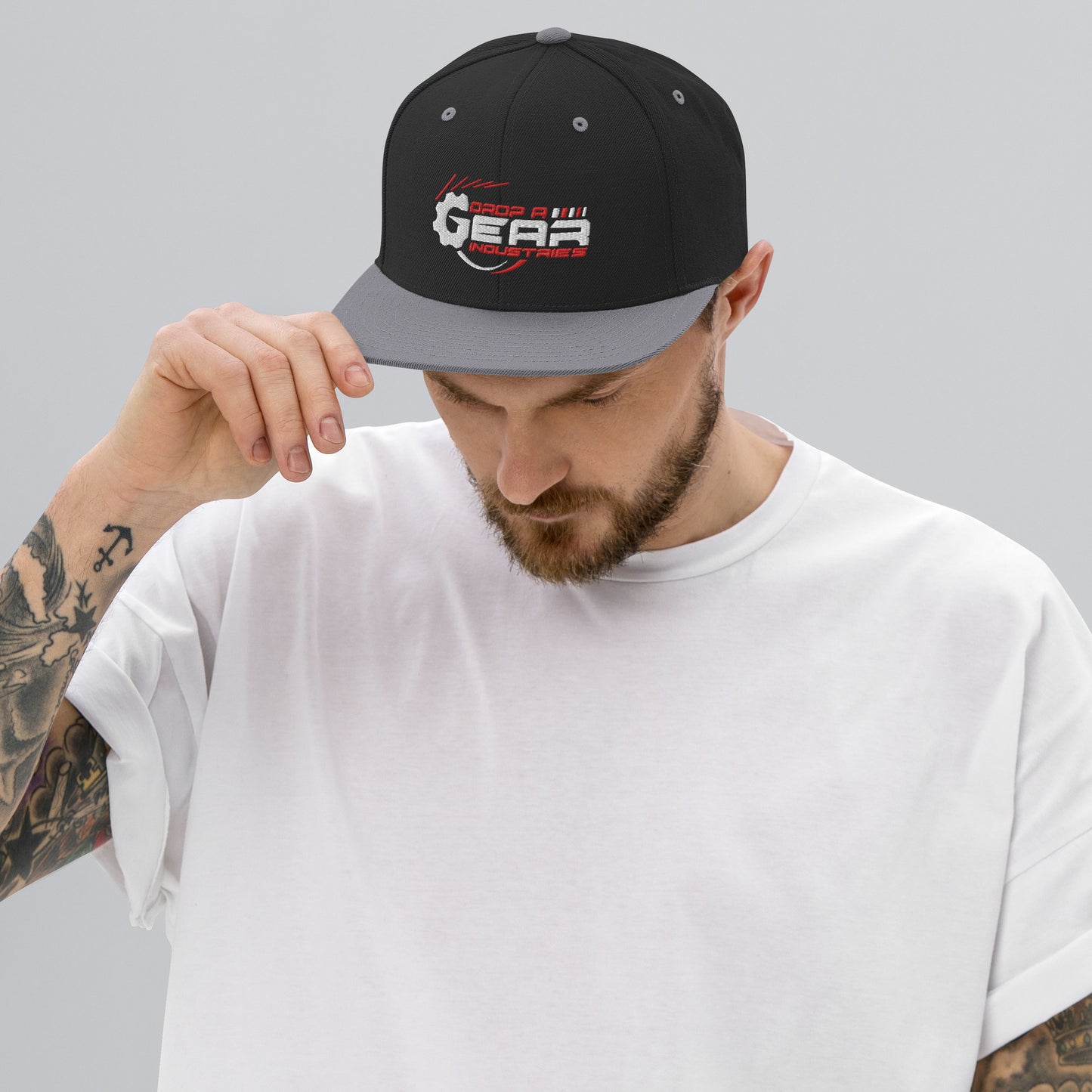 Drop A Gear logo Snapback Hat in dark colors